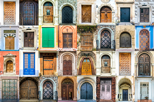 Colorful varied wooden doors and gates of old houses. Phot and tourism and travel concept