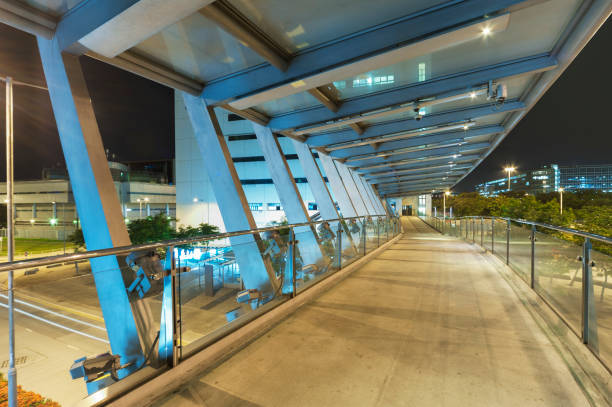istock Empty modern pedestrian walkway in midtown at night 1339971090