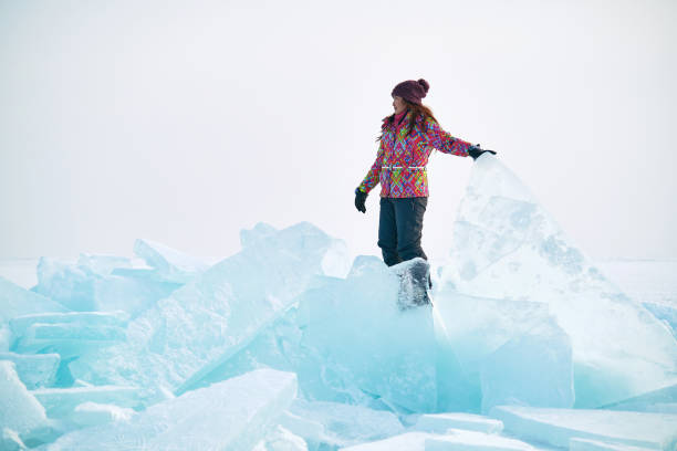 istock Traveller in Surreal Ice Landscape 1339976969