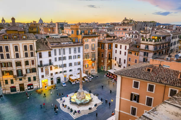 a splendid sunset over the rooftops of the historic heart of rome seen from a terrace in the pantheon square - rome ancient rome skyline ancient imagens e fotografias de stock