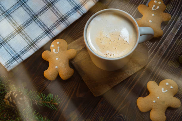 istock coffee cup and gingerbread cookies 1339979770
