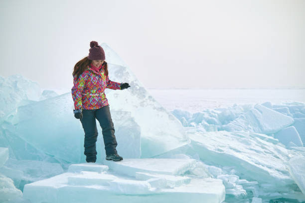istock Traveller in Surreal Ice Landscape 1339979852