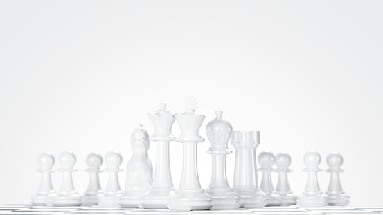 White Chess Pieces on a Chessboard isolated on white background