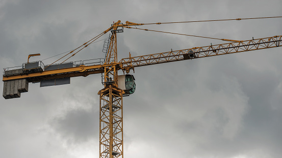 Fragment of construction equipment at a construction site.