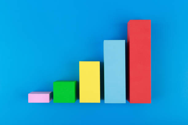 istock Business graph diagram with multicolored bars with rise against blue background 1339983289