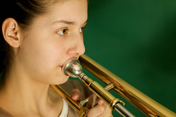 1,000+ Girl Playing Trumpet Stock Photos, Pictures & Royalty-Free