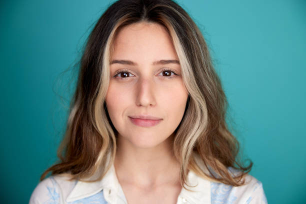 istock Young woman studio portrait 1339984621