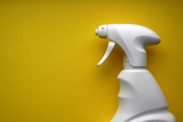 istock White spray isolated on a yellow background. 1339985273