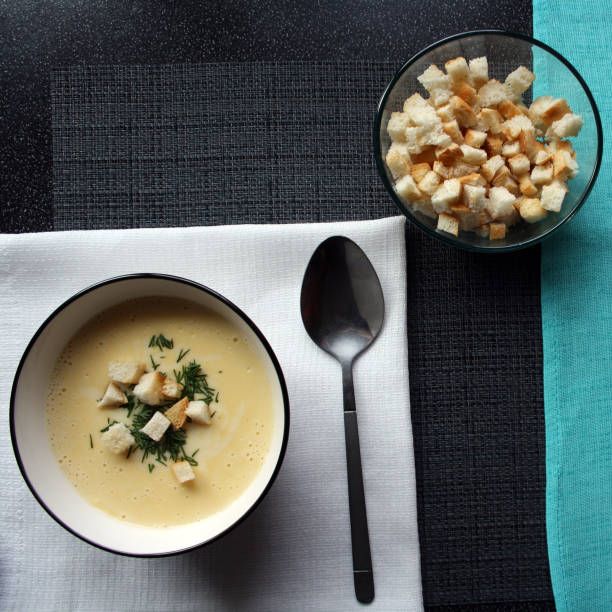 istock Cheese soup in a white bowl. 1339985555