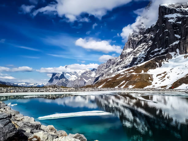 istock Swiss Alps with landscaped mountain lake 1339989505