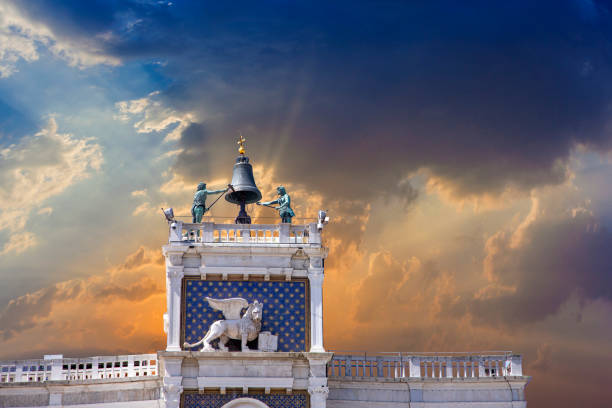 clock tower in Venice with hammering statues in Venice