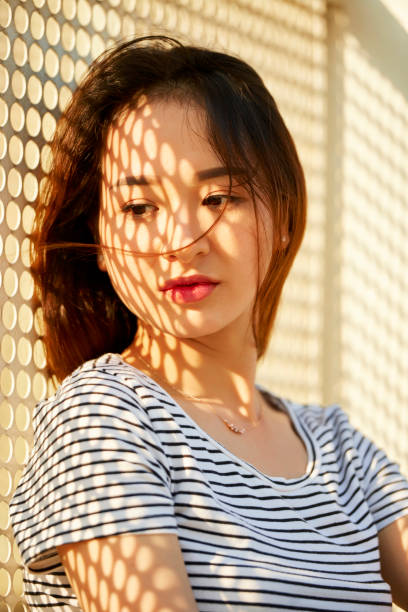 istock Pensive Young Beautiful Woman 1339990343