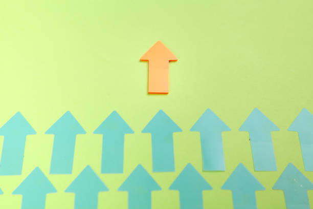 istock Leader arrow leading team. Leadership 1339990565