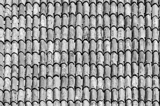 old antique roof tiles at the roof of an old house in Venice
