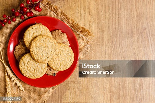 istock Christmas cookies on a wooden table 1339992169