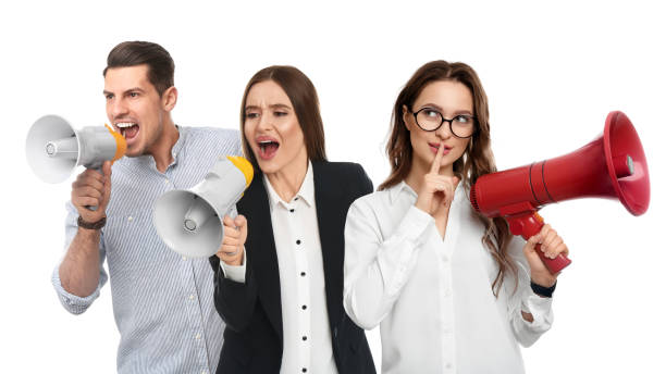 istock People with megaphones on white background. Banner design 1339992844