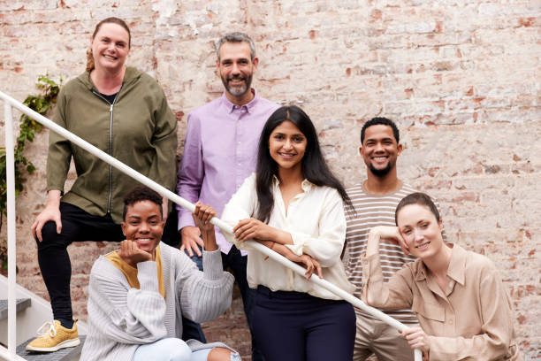 Portrait of a business team in a startup office. New business concepts shot with real people in Barcelona. puerto rican ethnicity stock pictures, royalty-free photos & images