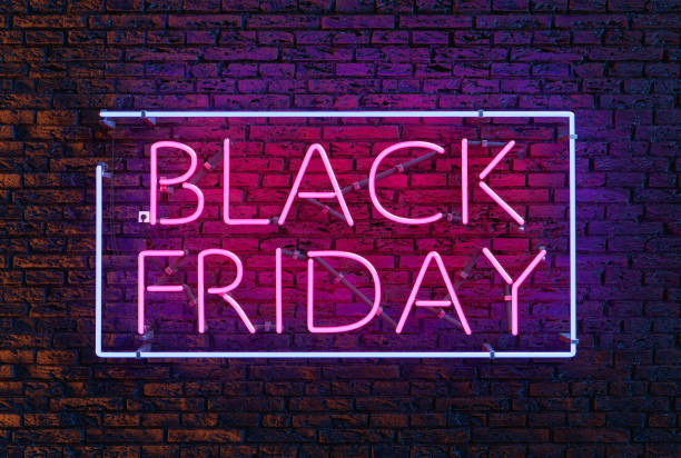 istock BLACK FRIDAY neon sign on brick wall 1340000854