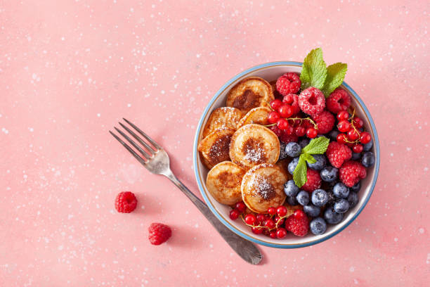 istock mini pancake breakfast bowl with berries and maple syrup 1340001180