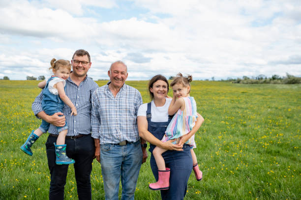 the family farm - agriculture teamwork farmer people imagens e fotografias de stock