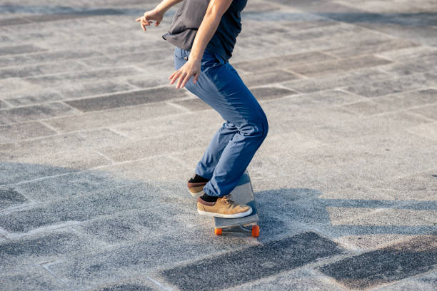 istock Skateboarder skateboarding outdoors in city 1340003759