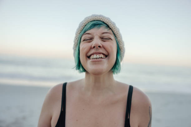 istock Cheerful winter bather smiling with her eyes closed 1340004109