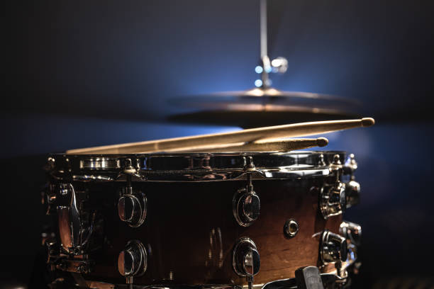istock Part of a drum kit, snare drum on a dark background. 1340009002