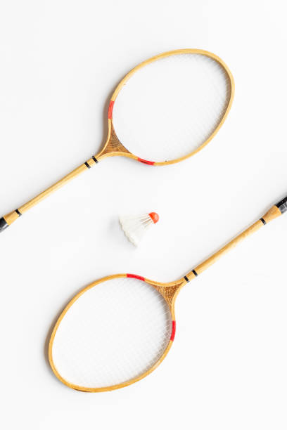 istock Flat lay of badminton rackets and shuttlecock. Top view 1340010220