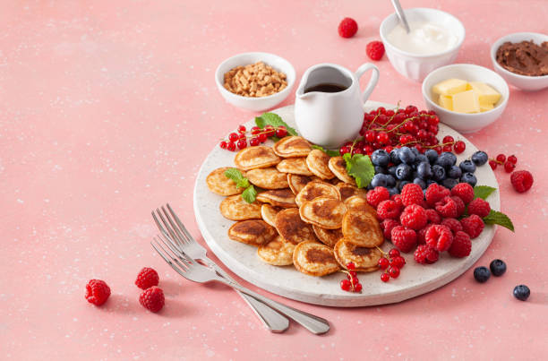istock american mini pancake board with berries and maple syrup 1340010396