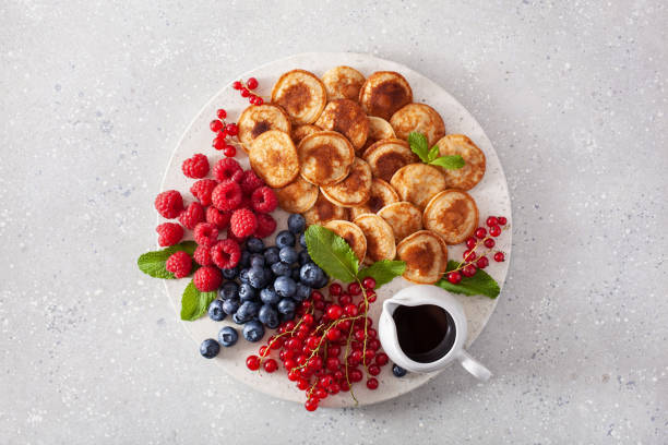 istock american mini pancake board with berries and maple syrup 1340010425