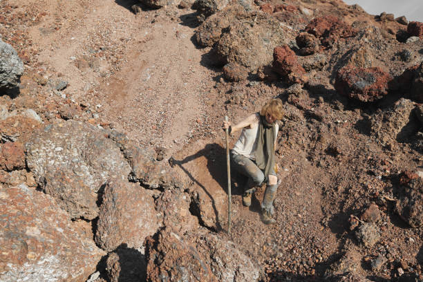 istock Woman coming down from the mountain 1340014681