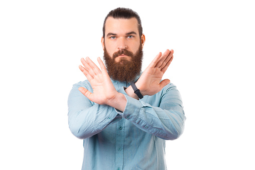 Making A Prohibited Young Bearded Man Is Making The Prohibited Sign Over White Background ...