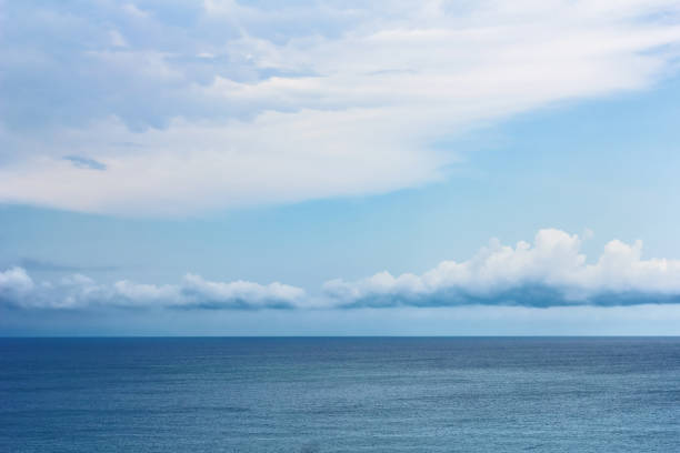 istock Blue sky and white clouds over sea 1340019887