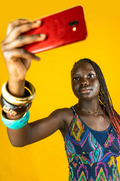 istock young african female takes a selfie 1340020158