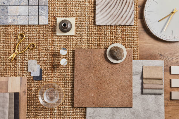 istock Flat lay of creative architect moodboard composition with samples of building, orange textile and natural materials and personal accessories. Top view, template. 1340022314