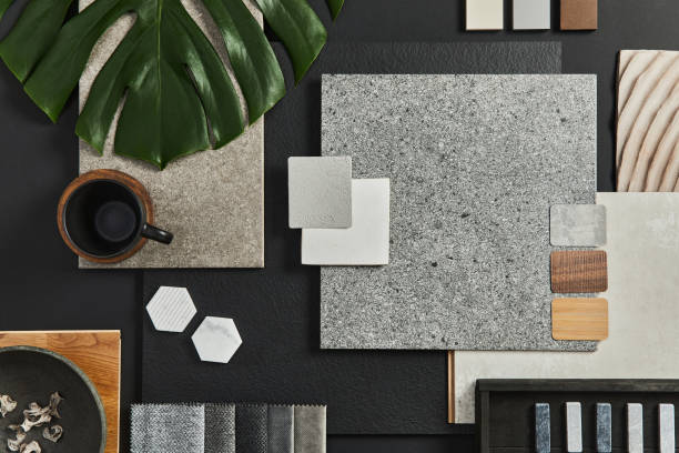 istock Flat lay composition of creative black architect moodboard with samples of building, textile and natural materials and personal accessories. Top view, black backgroung, template. 1340022332