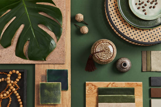 istock Stylish flat lay composition of creative architect moodboard design with samples of building, textile and natural materials and personal accessories. Top view, green background, template. 1340022344