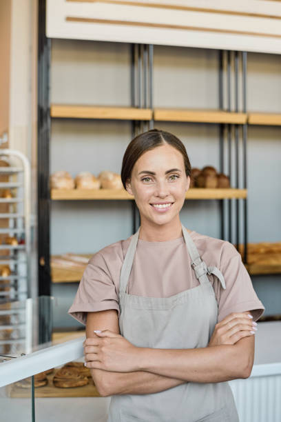 istock Happy young owner of bakery 1340025437
