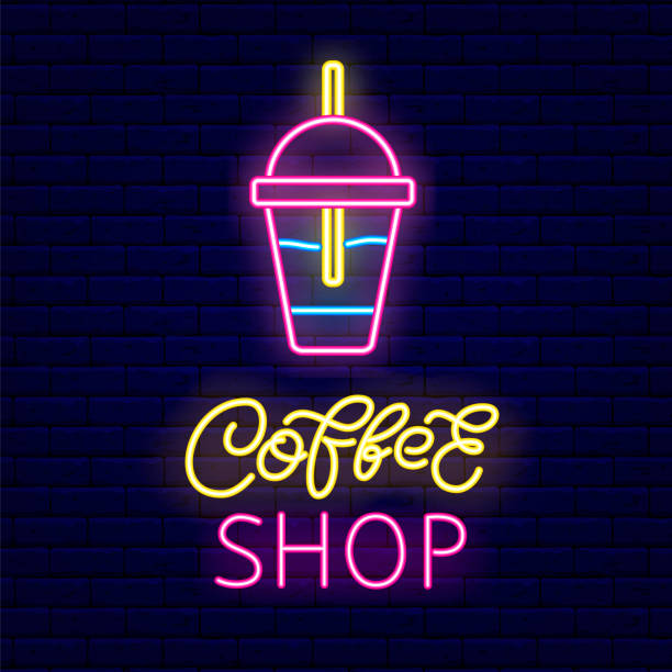 istock Cocktail glass with a straw neon light icon. Coffee shop brush lettering. Night signboard. Isolated vector illustration 1340027575