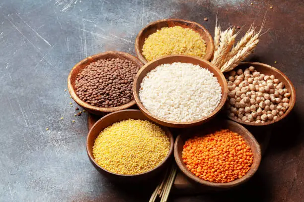 Photo of Gluten free cereals. Rice, buckwheat, corn groats, quinoa and millet