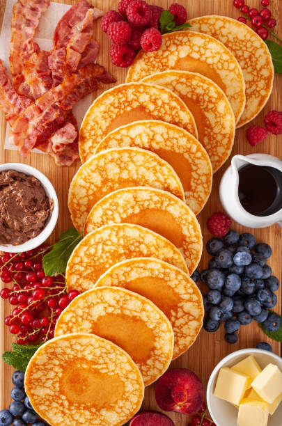 istock american pancake board with bacon berries maple syrup butter 1340028907