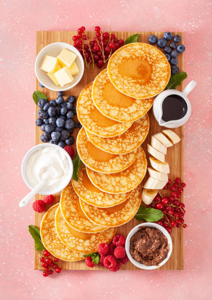 istock american pancake board with bacon berries maple syrup butter 1340028937