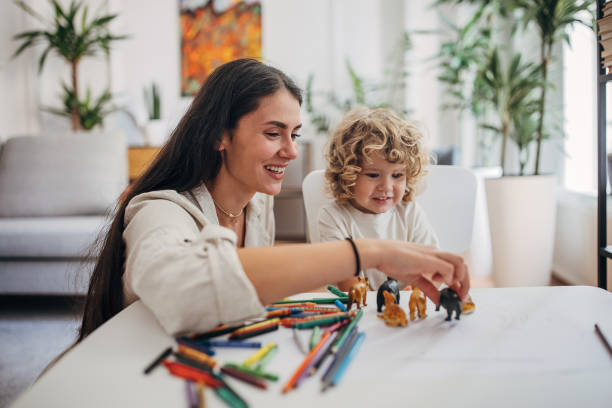 istock Mother and son coloring together and having fun 1340029856