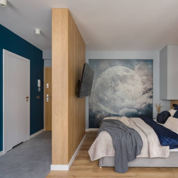 istock Wooden wall between corridor and bedroom with tv 1340030333