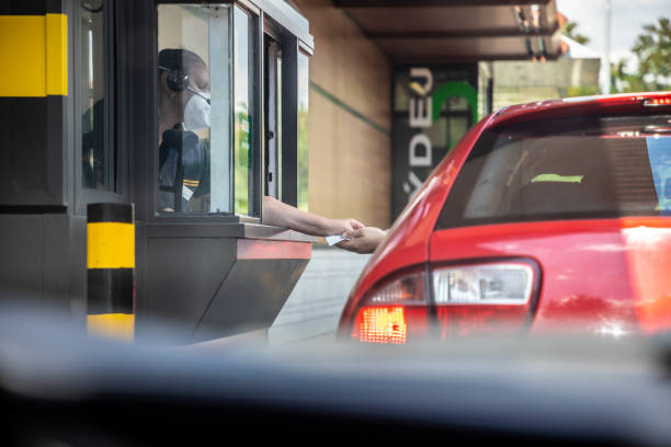 McDonald's restaurant Prague, Czech Republic - 11.08.2021: McDonald's restaurant, baying meal by drive thru from the car in Prague, Czech Republic . High quality photo park designer label stock pictures, royalty-free photos & images