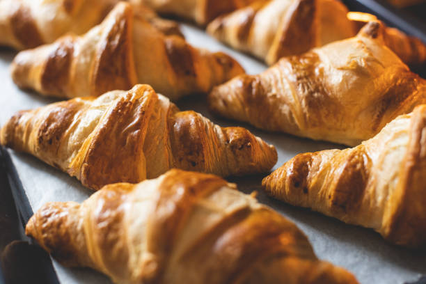 istock Croissants on baker's paper. 1340033579