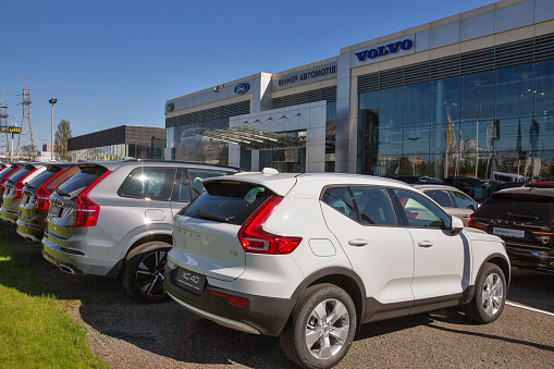 Kyiv, Ukraine - May 10, 2021: New SUV cars outdoors on display in Volvo Winner Aotomotive Center dealership company. Volvo Group is a Swedish multinational manufacturing company.