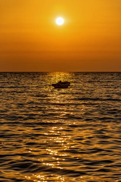 istock A boat at sunrise on the Adriatic Sea 1340039201