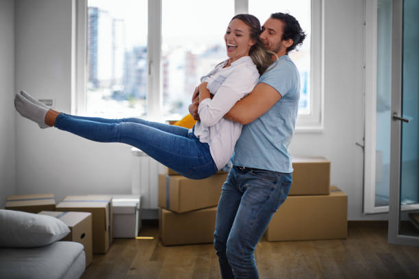 istock Couple excited for moving into a new apartment. 1340039734