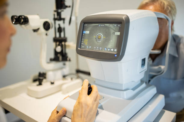 istock Senior man undergoing retinal scan on eye exam at medical clinic 1340040323